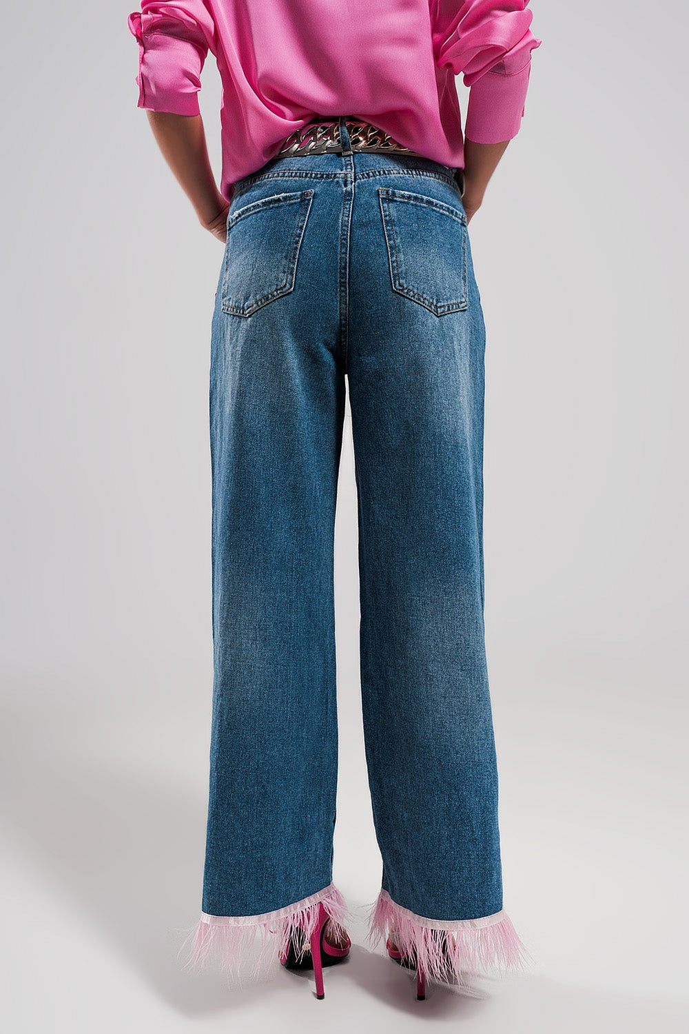 Straight leg jeans with PINK faux feather hem