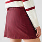 Straight mini skirt in burgundy with pockets