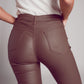 Stretch faux leather flare pants in beige