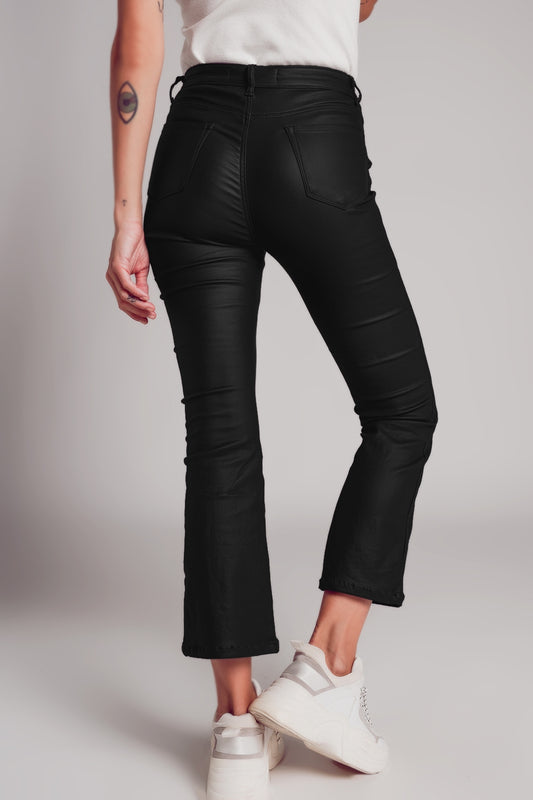 Stretch faux leather flare pants in black