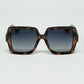 Q2 Sunglasses with a brown print frame and black temples