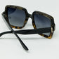 Sunglasses with a gradient print frame and black temples