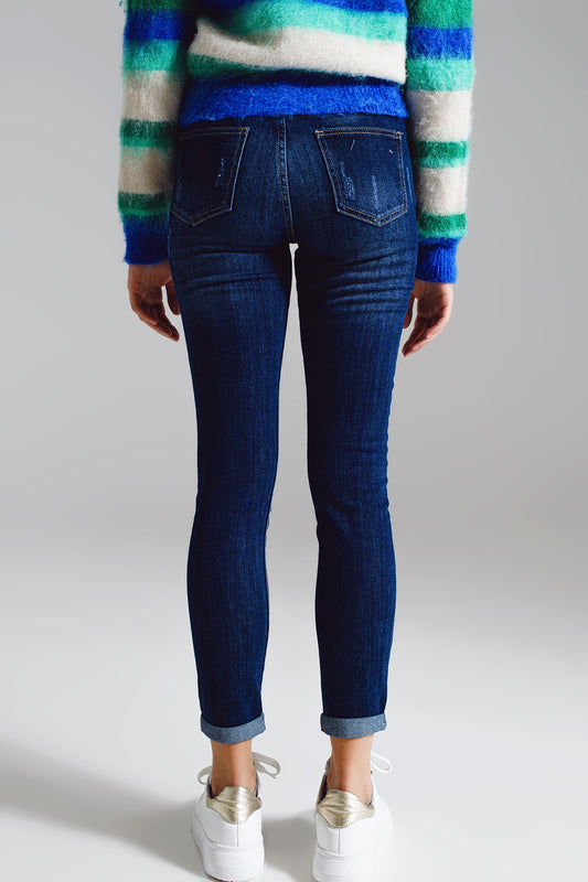 Super skinny jeans with visible front buttoning in midwash