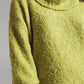 Sweater in green with a bardot neck.