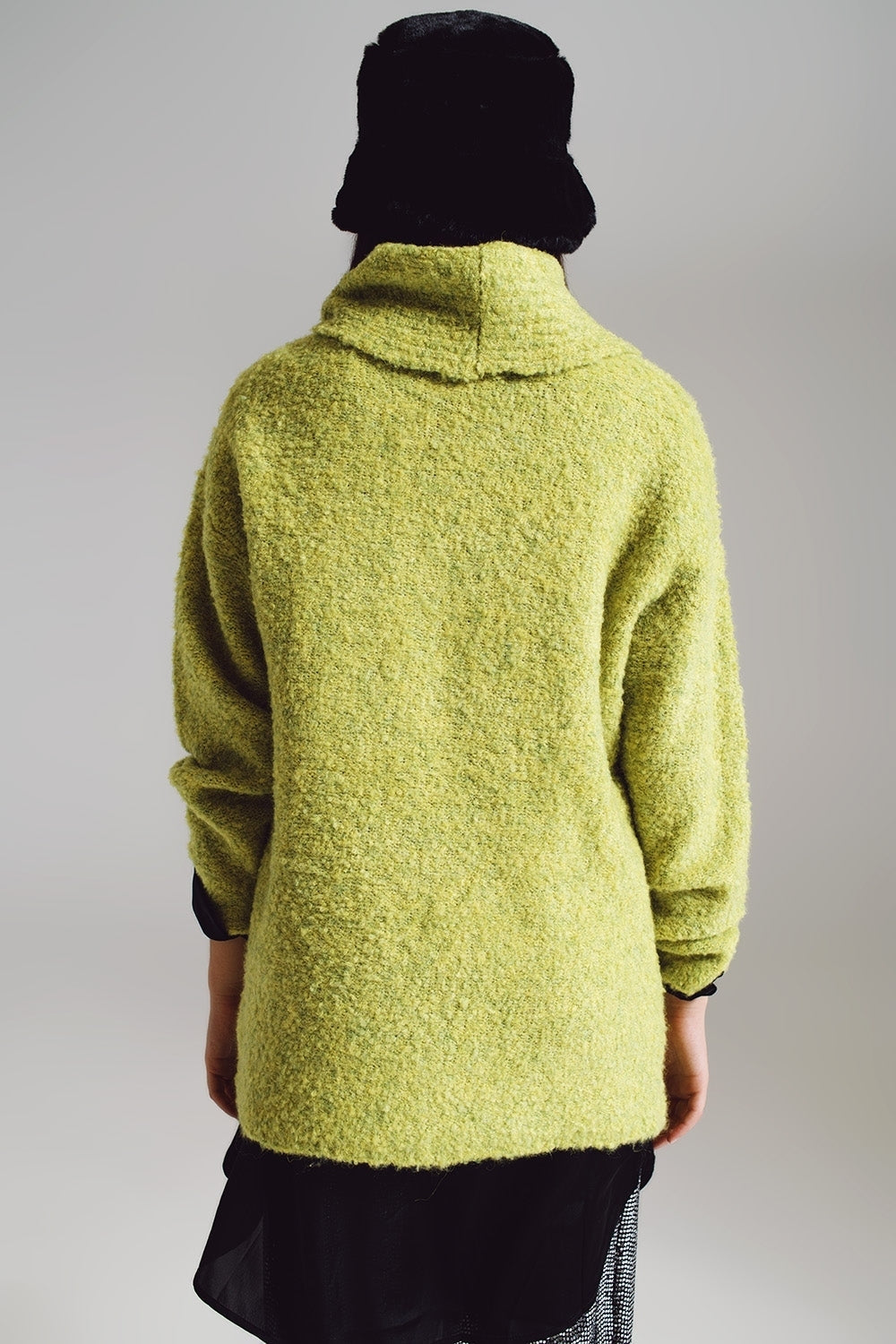 Sweater in green with a bardot neck.