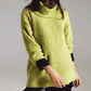 Sweater in green with a bardot neck.