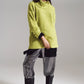 Sweater in green with a bardot neck.