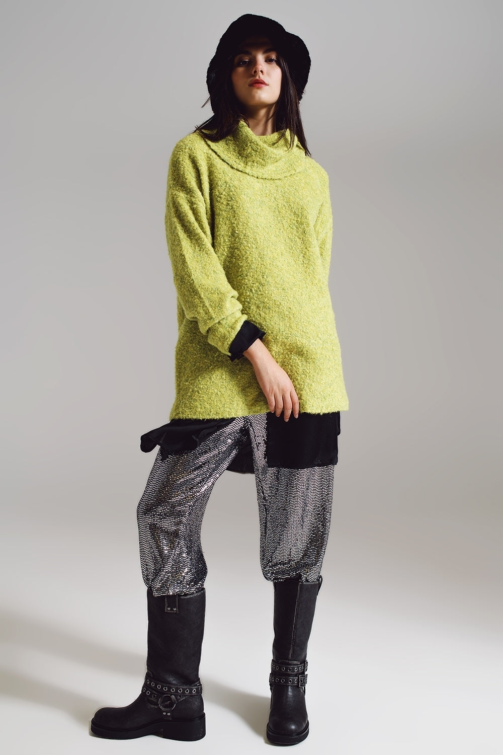 Sweater in green with a bardot neck.