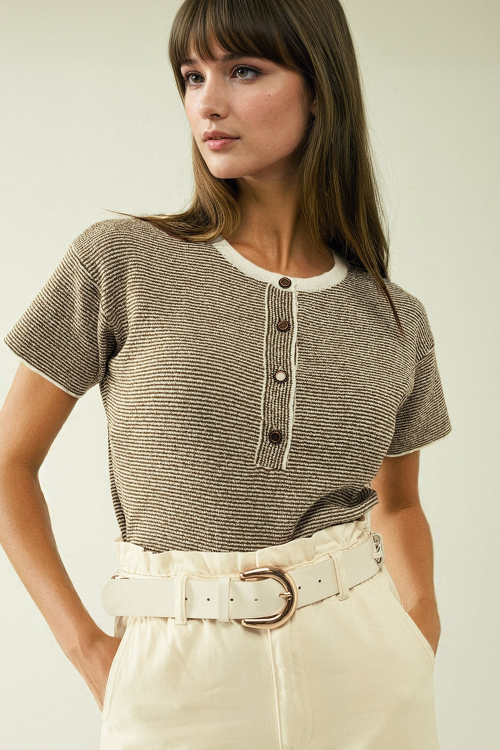 sweater with khaki stripes and gold button closure