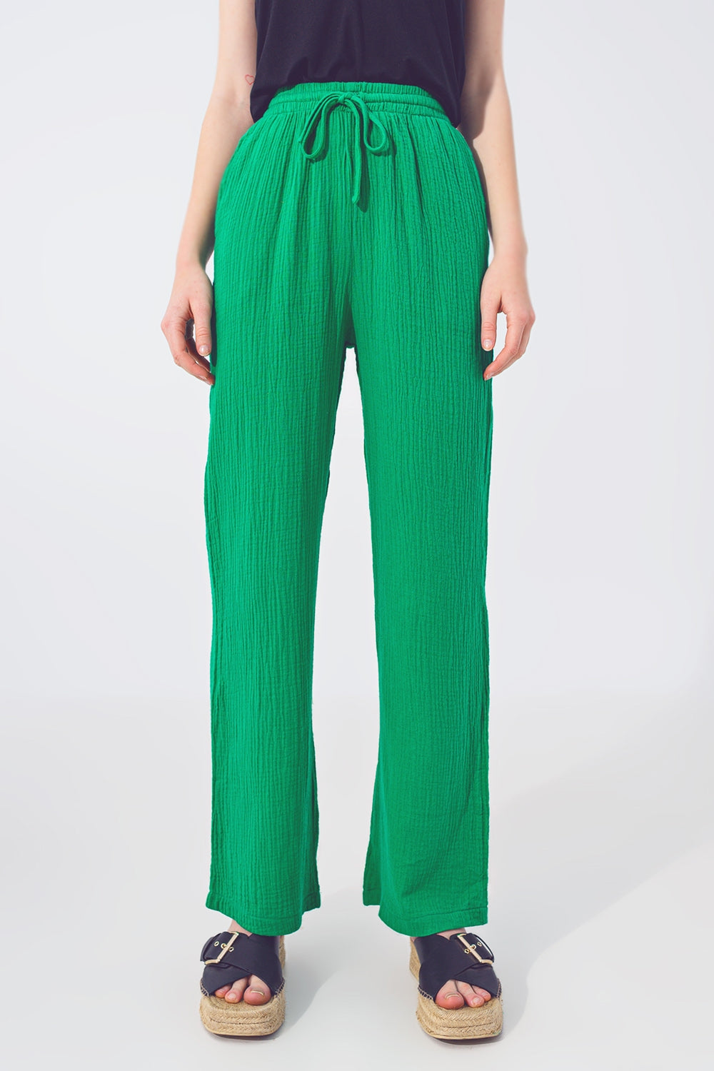 Pantalones holgados texturizados en verde