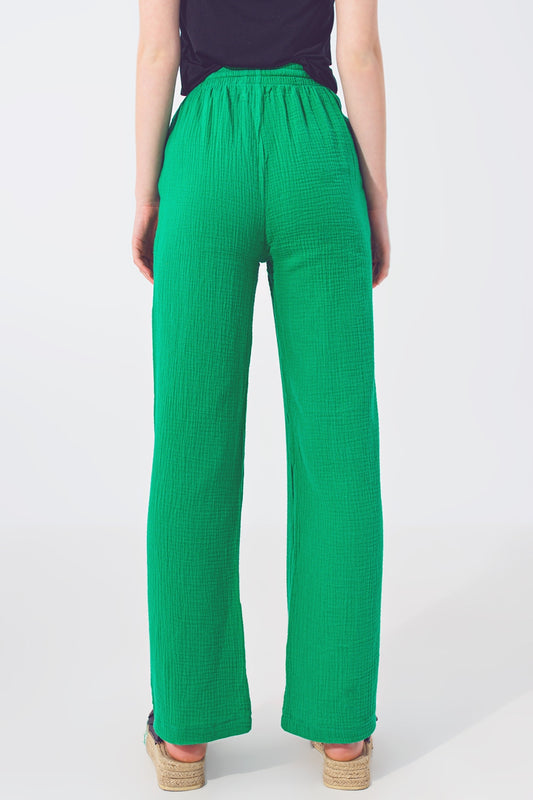 Pantalones holgados texturizados en verde