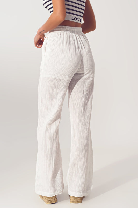 Pantalones de pierna ancha con textura en blanco