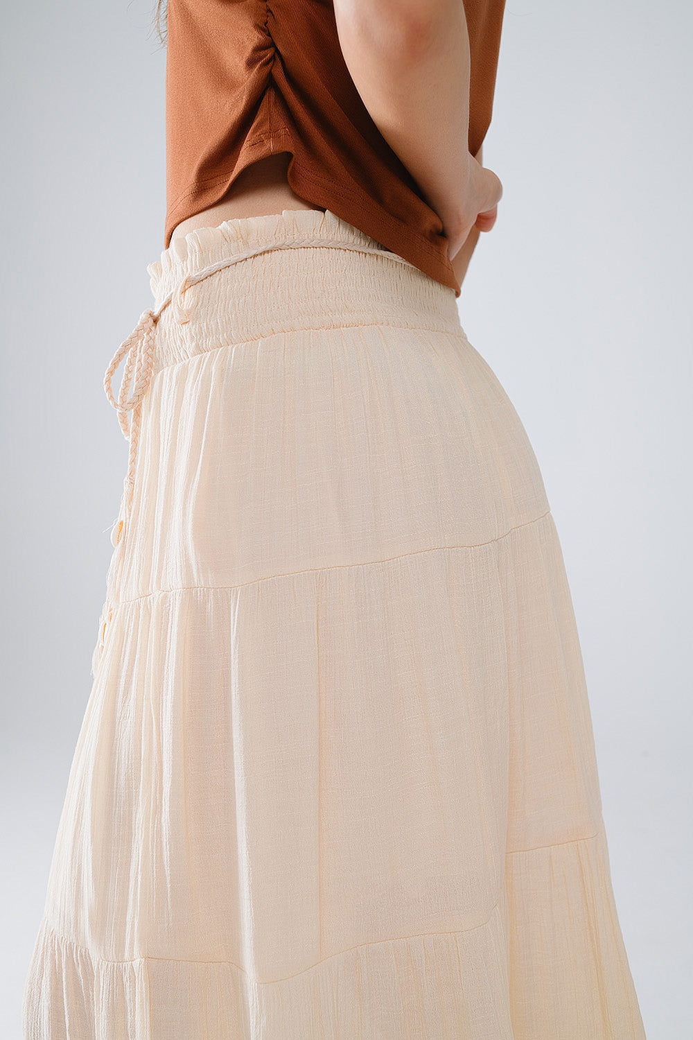 Tiered Maxi Skirt In Beige Wtih Elastic Waist And Shell Details