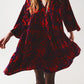 Q2 Tiered mini smock dress in animal print in red