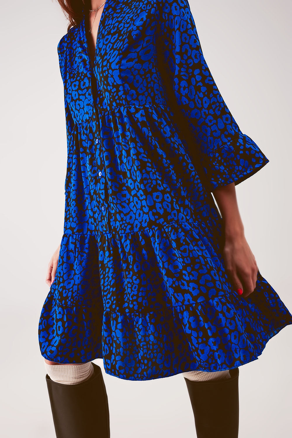 Tiered mini smock dress in blue animal print