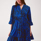 Tiered mini smock dress in blue animal print