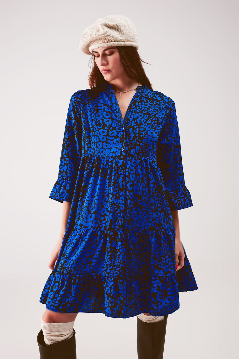 Tiered mini smock dress in blue animal print