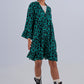 Tiered smock mini dress in green animal print