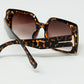 tiger print square sunglasses with gold detail on the side