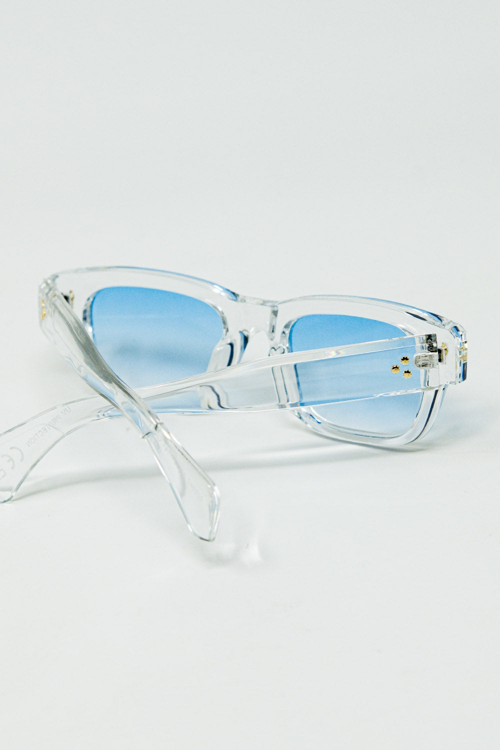 Translucent White Sunglasses with Oval Light Blue Lenses