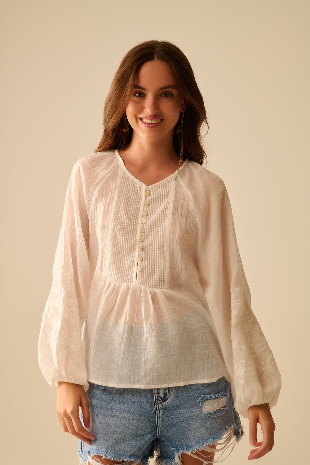Q2 white chiffon blouse with embroidery on the sleeves