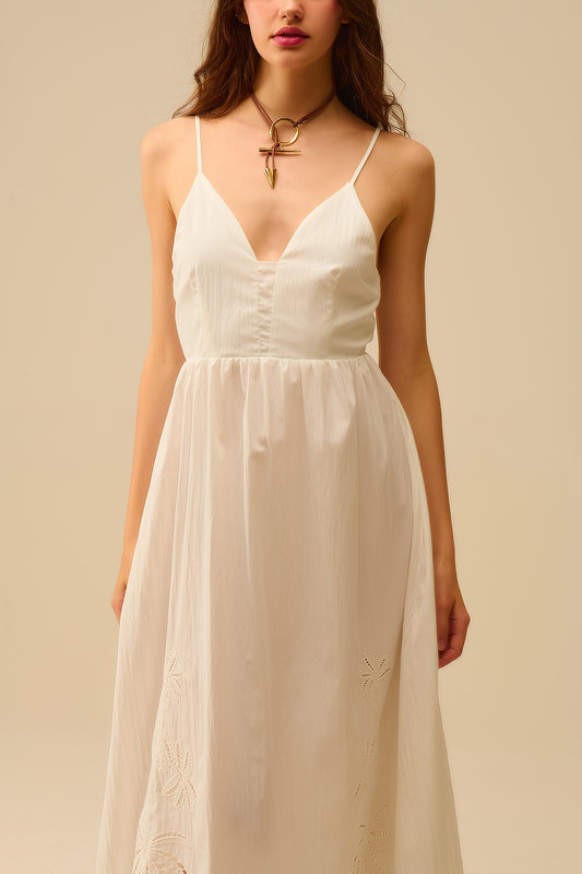 White maxi dress with embroidered palms