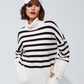 Q2 White oversized trutleneck sweater with black stripes and splits on the side