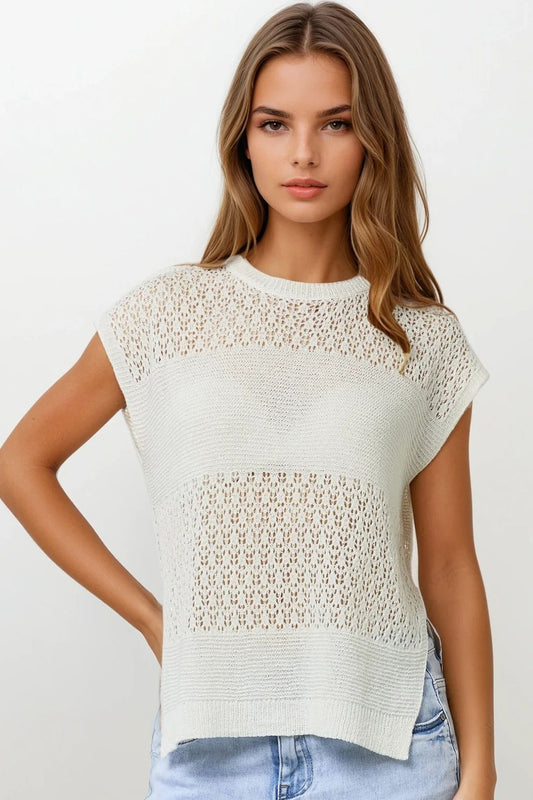 White sweater with soft open knit and dropped sleeves