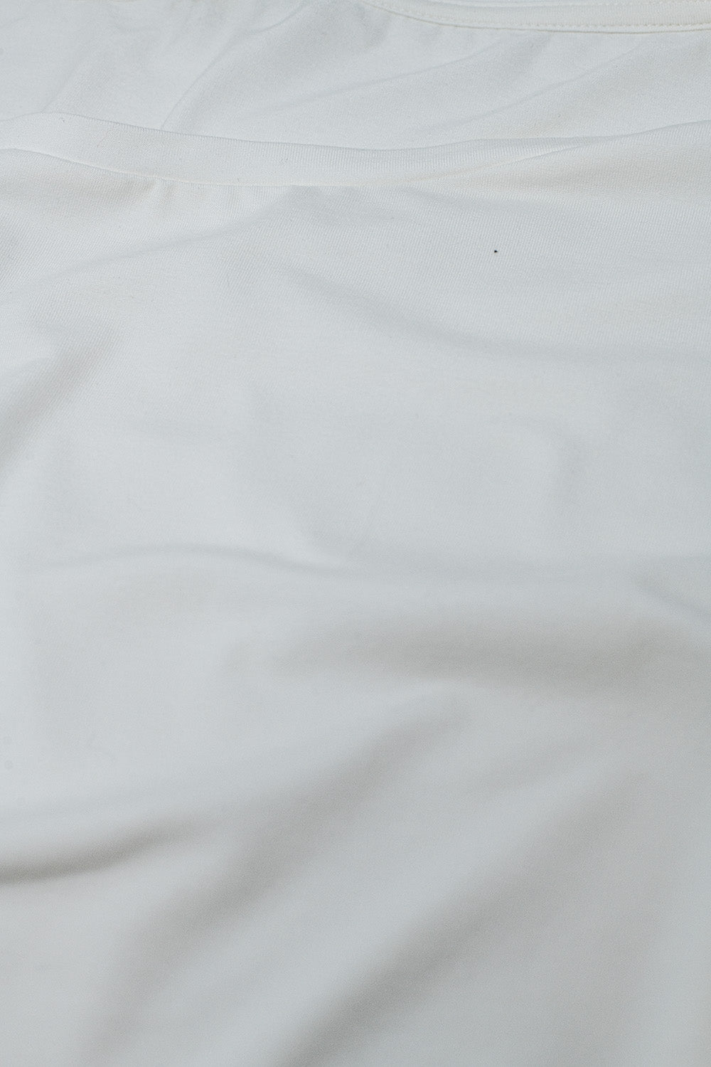 white T-shirt made of fine stretch fabric with a boat neck