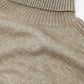 wide beige sweater with ribbed sleeves