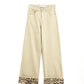 Q2 Wide leg beige pants with leopard print at the bottom