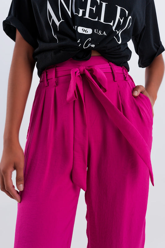 Pantalón fucsia de pernera ancha con cinturón