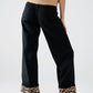 Wide leg black pants with leopard print at the bottom