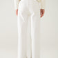 Wide leg cream pants with leopard print at the bottom