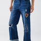 Wide leg jeans embellished with some patches