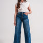 Wide leg jeans with exposed buttons