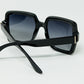 Wide square frame sunglasses with gold detail on the temples