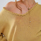 Wide V-neck Light Sweater With Braided Detail In Gold