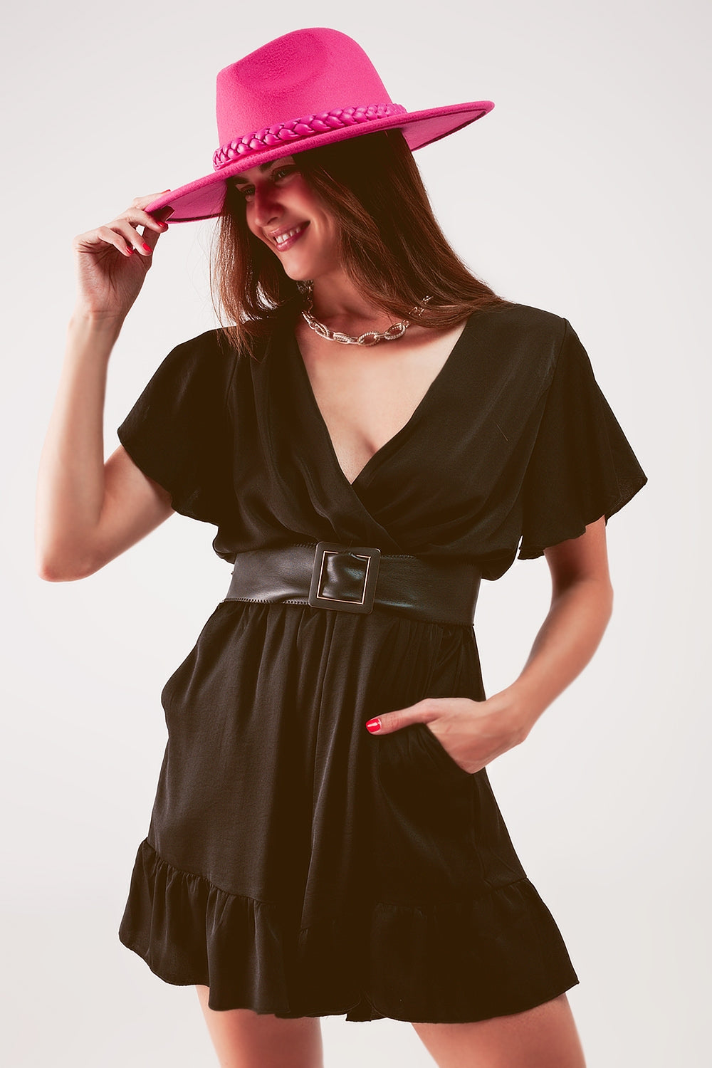 Wrap front frill hem jumpsuit in black