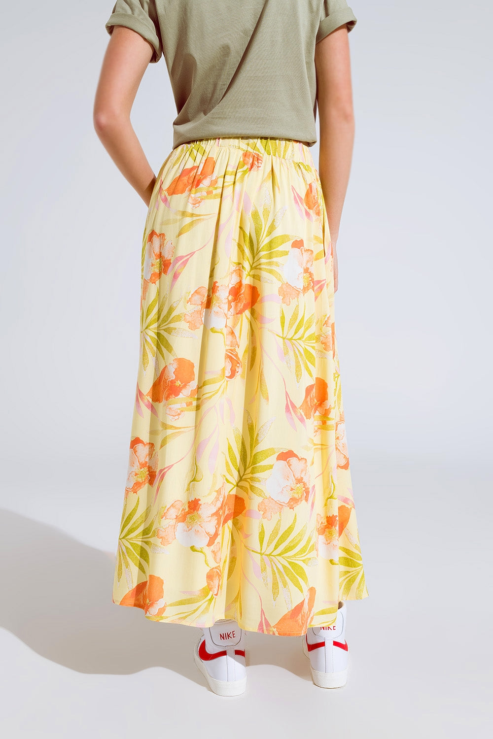 Yellow maxi skirt with tropical print