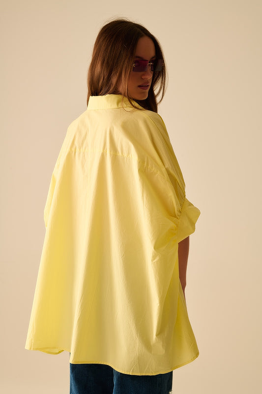 Yellow oversized blouse with short sleeve