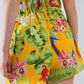 Yellow Short Jumpsuit with Tropical Print and Drawstring Closure