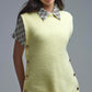 Q2 Yellow sleeveless sweater with gold buttons on side