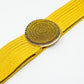 Yellow woven belt with round buckle with rhinestones