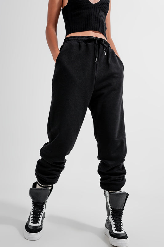 Adjustable waistband joggers in black Szua Store