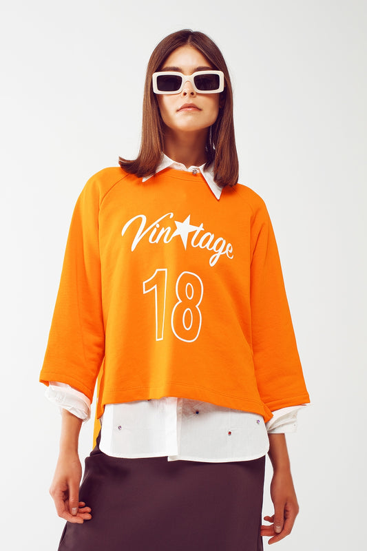 Assymetric sweatshirt with Vintage 18 Text in orange - Szua Store