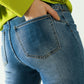 Basic straight jeans with five pockets and frontal metalic button closure