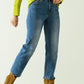 Basic straight jeans with five pockets and frontal metalic button closure