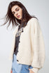 Q2 Beige cardigan with a deep V neck and Black Buttons