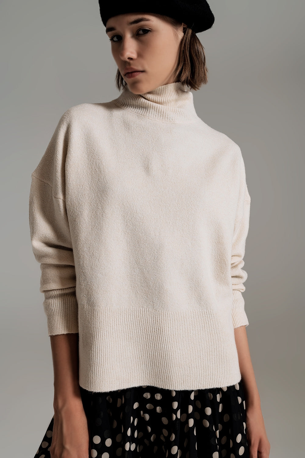 Beige turtleneck sweater in a soft knitted fabric - Szua Store